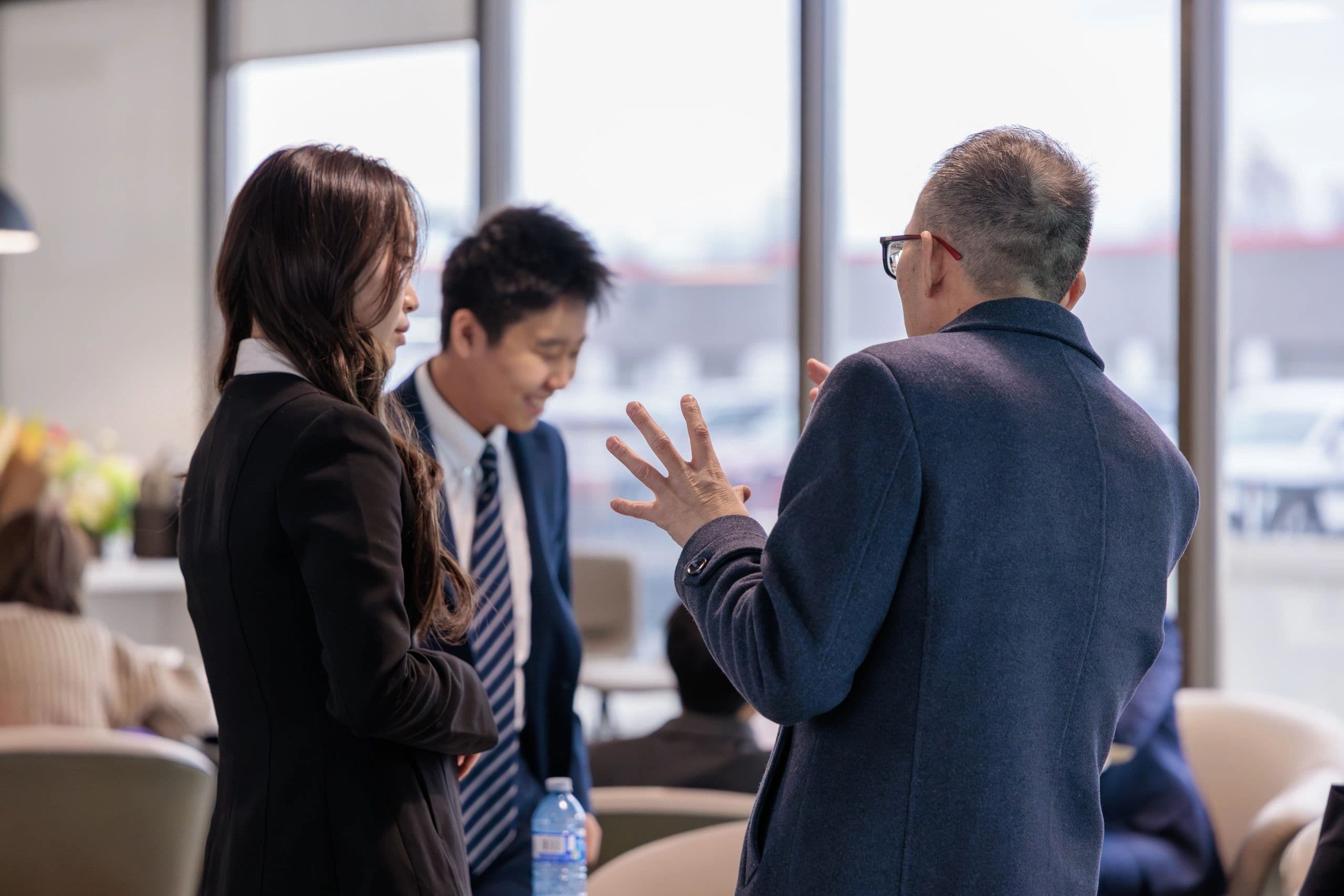 Students discussing AI ethics and social impact